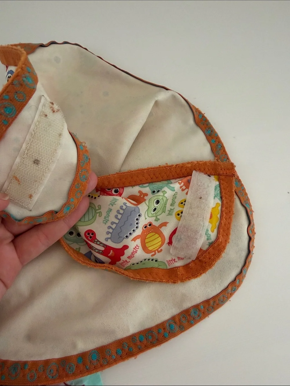 Kids Orange Trim Baby Bib with Colorful Monster Print